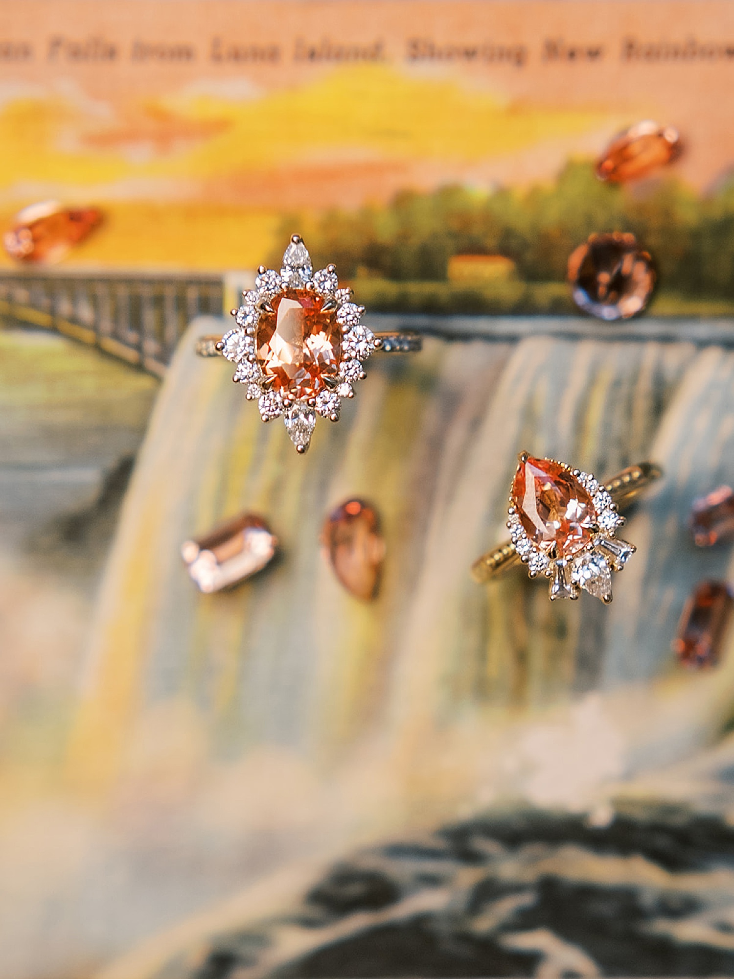 orange jewels surrounded by clear diamonds and a gold band 