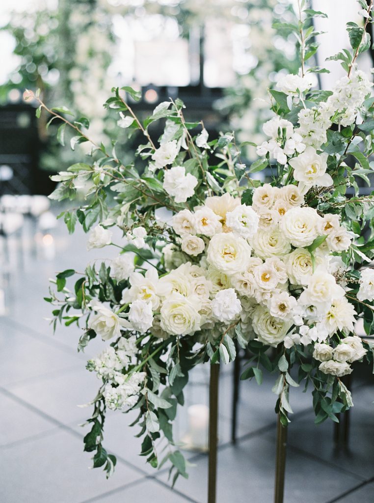 Detail of off-white florals at wedding.
