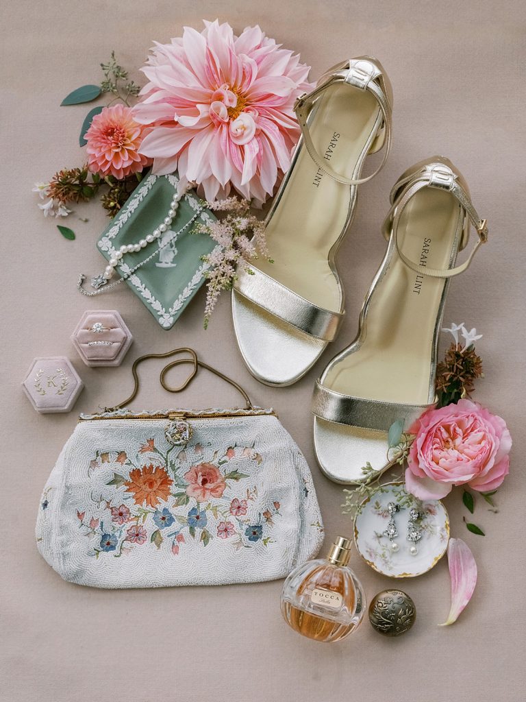 A flat lay at a Baltimore wedding with shoes and jewelry details