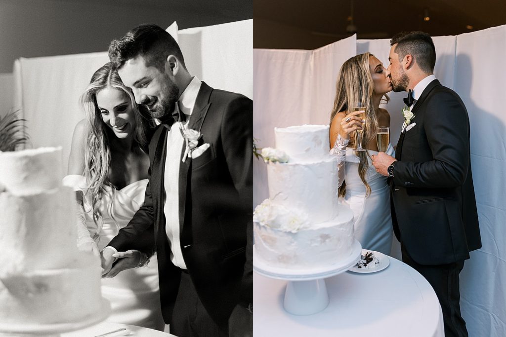 Newlyweds cut their modern, three tiered white cake at their wedding reception.