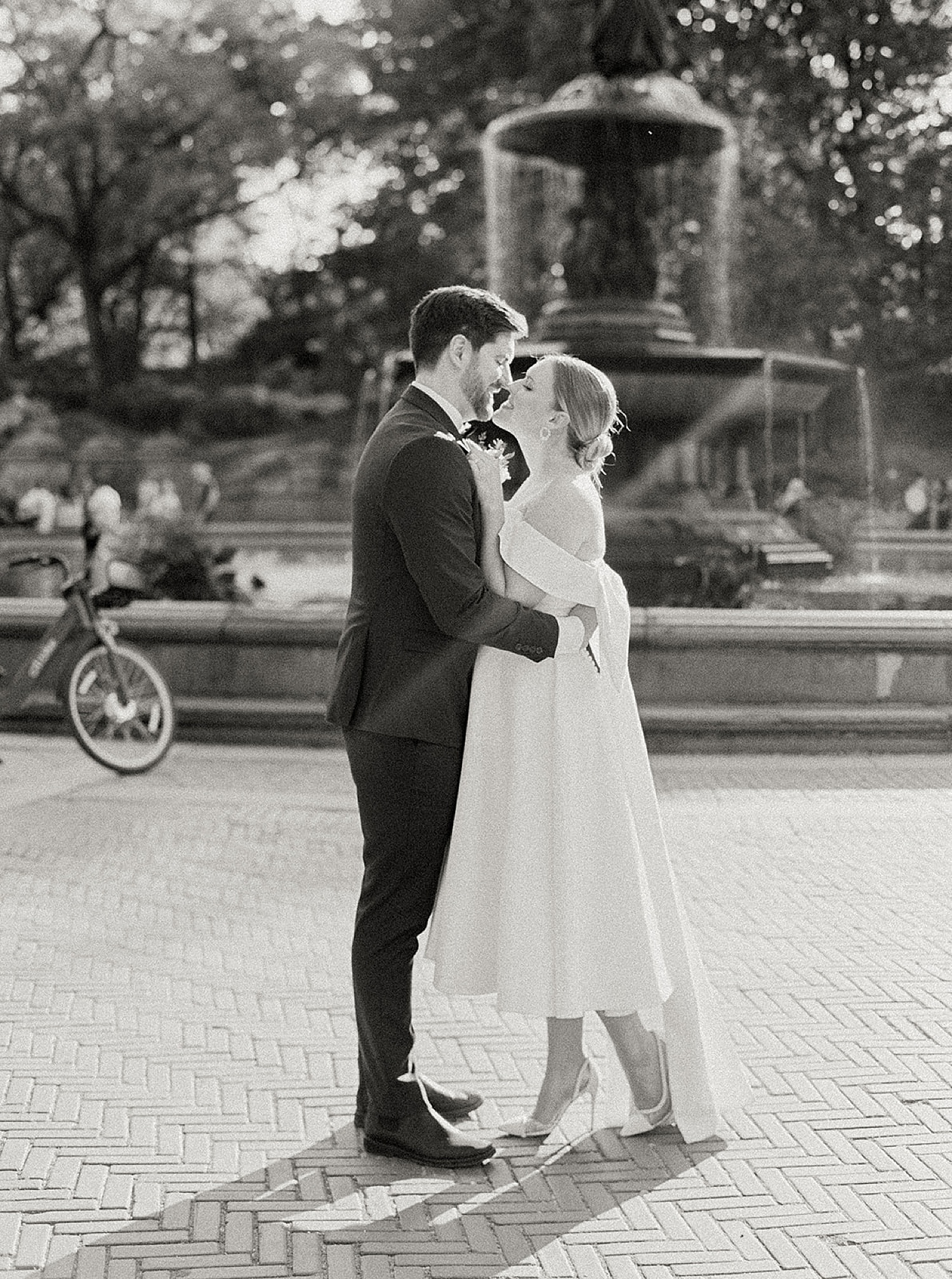 bride and groom standing in Central Park after eloping during the day in New York 