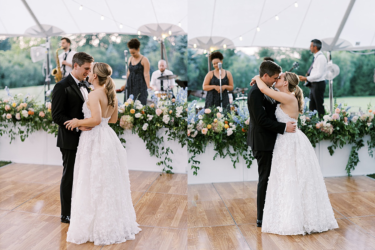 bride and groom share first dance with live band and flower covered stage at tented reception shot by destination luxury photographer