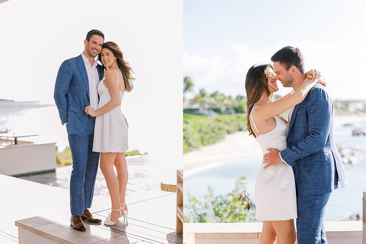 bride in satin minidress and groom in blue linen suit pose overlooking the beach during Anguilla Elopement 